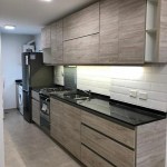Modern Kitchen Design - Kitchen Cabinet Works - Gretarck Décor and Interior Design - House Finishing Services in Kampala - Uganda