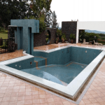 Get the best price quote on swimming pool tile works in Kampala, Uganda with Gretarck Décor and Interior Limited's flooring works services for home, resort and recreational swimming pools.